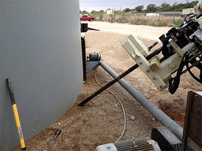 Drilling under a standing structure to test for contamination